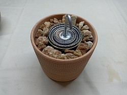 Fogón de Bioetanol de un quemador en terracota labrada. Costo $900 (Discontinuados por encargo)